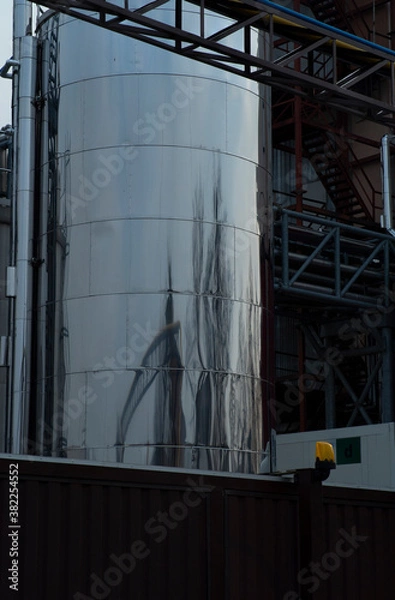 Fototapeta reflection in a modern metal industrial building