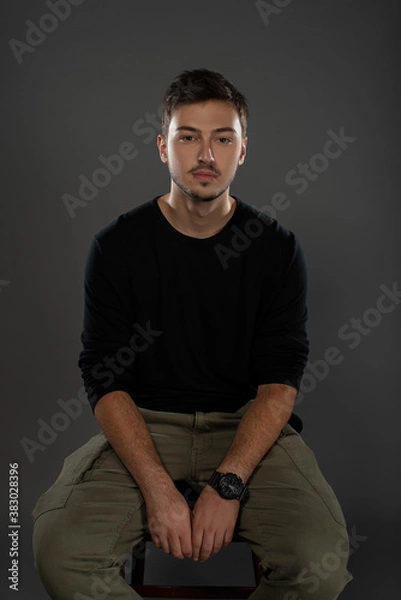 Fototapeta Portrait of an actor boy posing in studio on grey background. Isolated