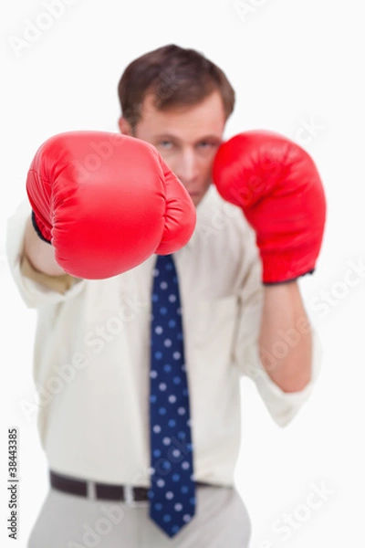 Fototapeta Close up of businessman's fist attacking