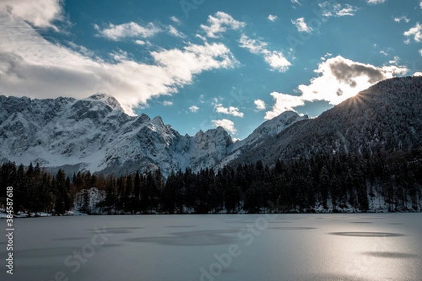 Fototapeta Frozen lake of fusine in a sunny afternoon, Friuli-Venezia Giulia, Italy