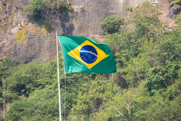 Fototapeta Brazilian flag outdoors in the city of Rio de Janeiro.