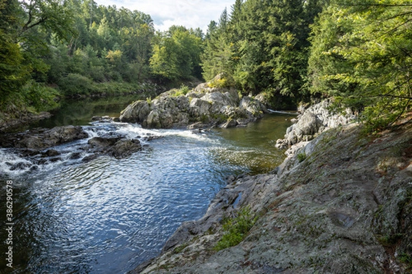 Fototapeta The Missisquoi River gathers in a natural pool above Big Falls