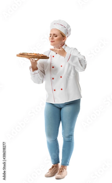 Fototapeta Mature female chef with tasty pizza on white background