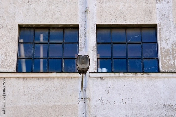 Fototapeta street lamp on the facade in Bilbao city,  Spain, 