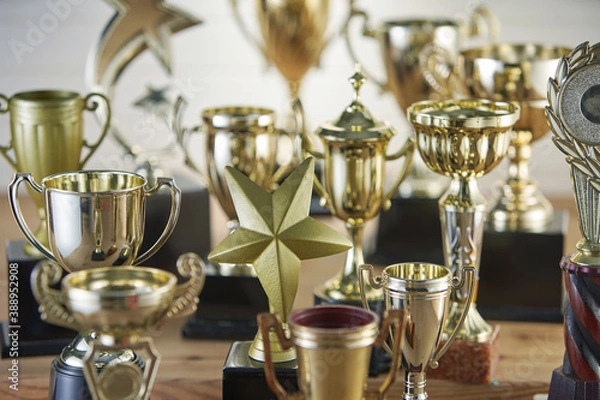 Fototapeta selective focus on one trophy with other trophies as background