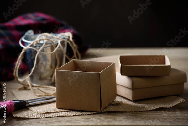 Fototapeta Brown paper gift box and decoration accessories, present for giving in special day