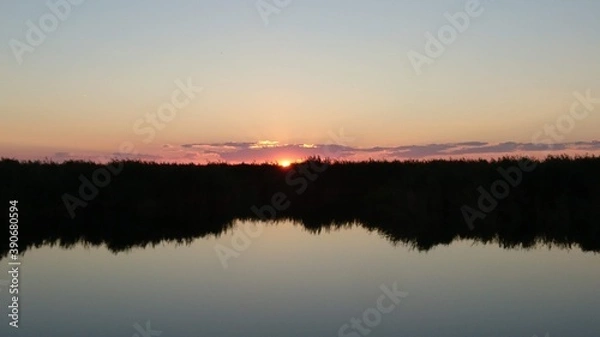 Fototapeta sunset over lake