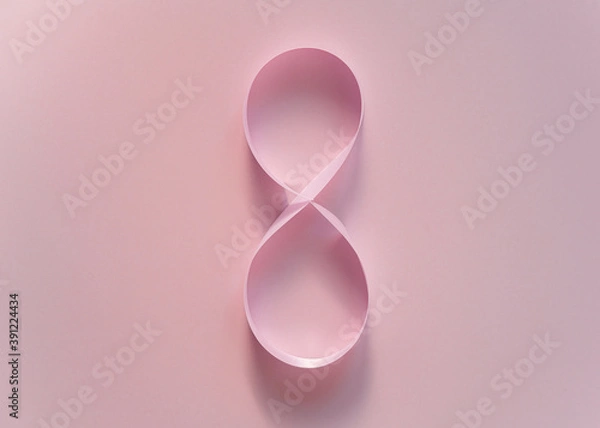 Fototapeta International women day Number eight made of pink satin ribbon on pink background