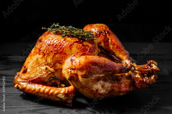 Fototapeta Big delicious baked thanksgiving's Turkey with vegetables