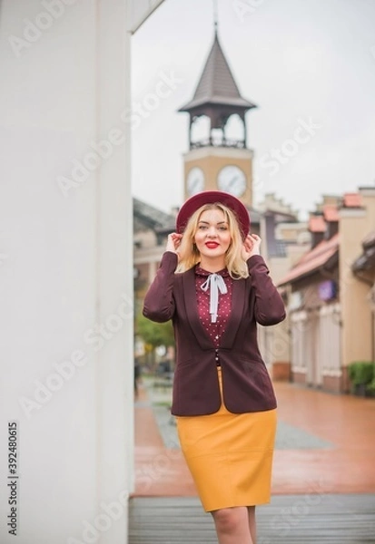 Fototapeta Woman at city, plus size blonde nice woman outdoor portrait. Pretty nice lady in fashionable warm outfit, lifestyle, shopping time, woman at walk