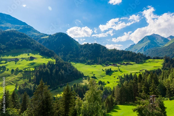 Fototapeta Mountain valley village landscape in Venediger alps . Mountain green valley village view austria near matrei in osttirol