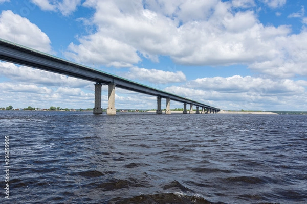 Fototapeta view of the Zaymishchensky bridge across the Volga, photo was taken on a sunny summer day, view from the Volga river