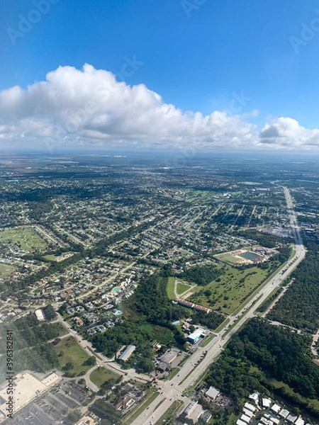 Fototapeta Aerial view of a busy residential area from airplane; Fort Myers, Florida