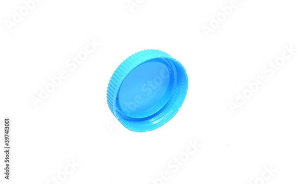 Fototapeta Blue Plastic bottle caps isolated a white background.