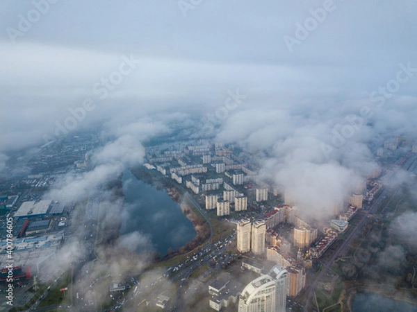 Fototapeta Aerial drone view. Low clouds over the Dnieper river in Kiev. Foggy autumn morning.