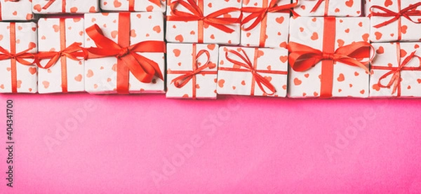 Obraz Holiday composition of gift boxes with red hearts on colorful background with empty space for your design. Top view of Valentine's Day concept