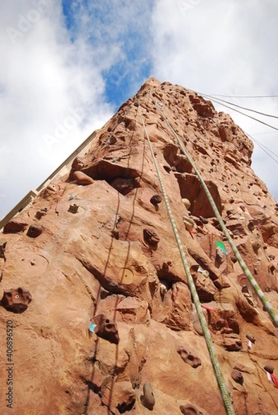 Fototapeta Rock Climbing has never been so close to home. Urban Rock Climbing Wall Queens NYC