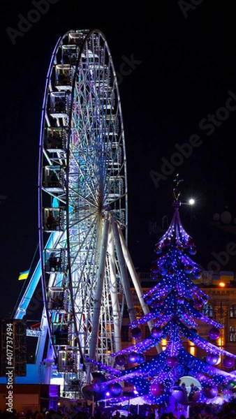 Fototapeta kiev ukraine ferris wheel and christmas tree