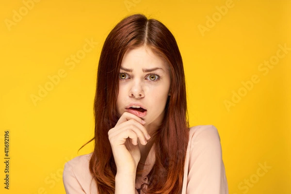 Fototapeta emotional attractive woman glamor studio fashion yellow background