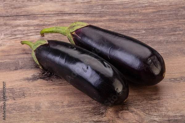 Fototapeta Two ripe raw eggplant isolated