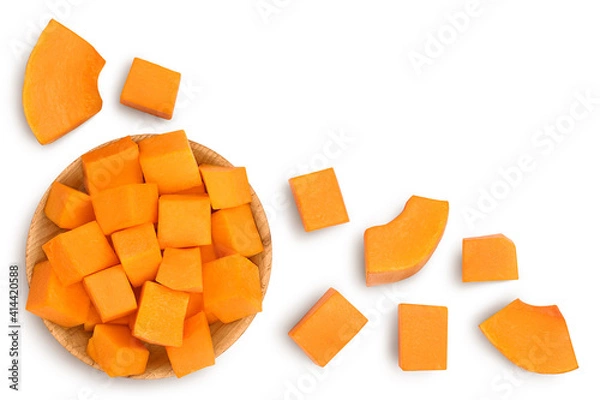 Fototapeta butternut squash slice in wooden bowl isolated on white background with clipping path. Top view with copy space for your text. Flat lay