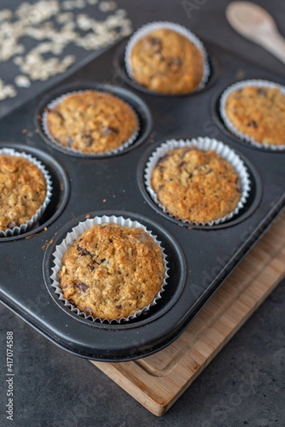 Fototapeta healthy home made oat muffins with chocolate chips