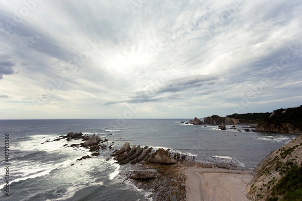 Fototapeta clouds over the sea and cliff