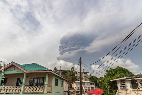 Fototapeta  SAINT VINCENT AND THE GRENADINES, SAINT VINCENT - APRIL 09, 2021: Clouds of ash over the island after eruption of La   Soufriere volcano 