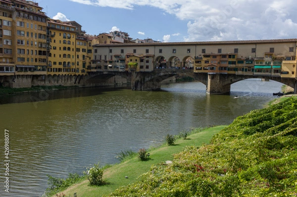 Fototapeta Ponte Vecchio view with Arno river with cityscape of Florence, Italy