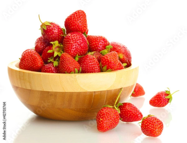 Fototapeta sweet ripe strawberries in wooden bowl isolated on white