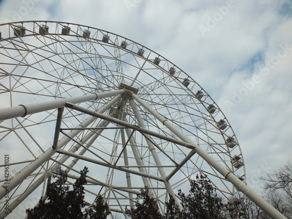 Fototapeta ferris wheel against sky