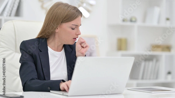 Fototapeta Sick Businesswoman with Laptop Coughing in Office 