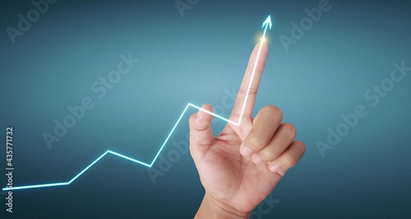 Fototapeta Hand touching  graphs of financial indicator and accounting market economy analysis chart