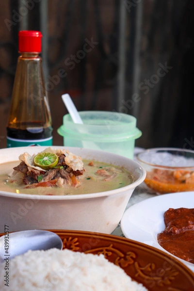 Fototapeta Soto Betawi, A Delicious Beef with Milk Stew from Jakarta Indonesia