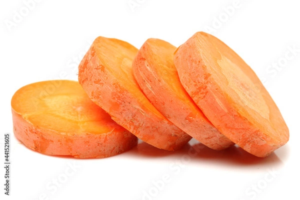 Fototapeta Fresh sliced carrot on a white background