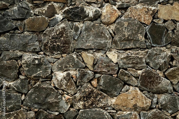 Fototapeta Stone wall, Texture of a stone wall. Stone wall texture background, rock wall.