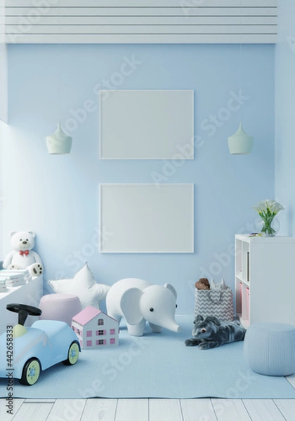 Fototapeta Playroom with dolls and picture frames.