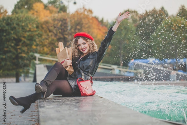 Fototapeta Young happy woman outdoor portrait