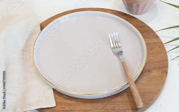 Fototapeta table setting with napkin and cutlery