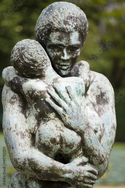 Fototapeta statue of woman holding child