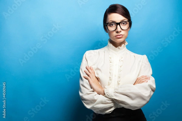 Fototapeta Strict woman in large glasses