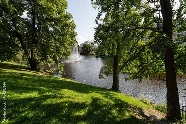 Fototapeta A river in the park in Riga, Latvia