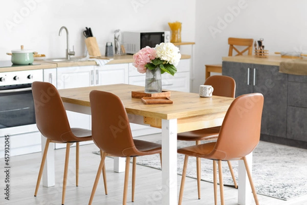 Obraz Interior of stylish kitchen with dining table