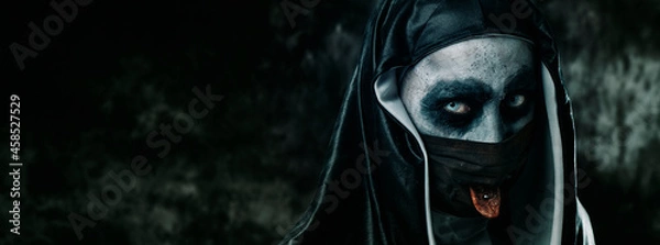 Fototapeta evil nun sticking out her tongue, web banner