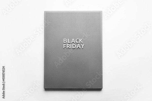 Fototapeta Board with text BLACK FRIDAY on light background