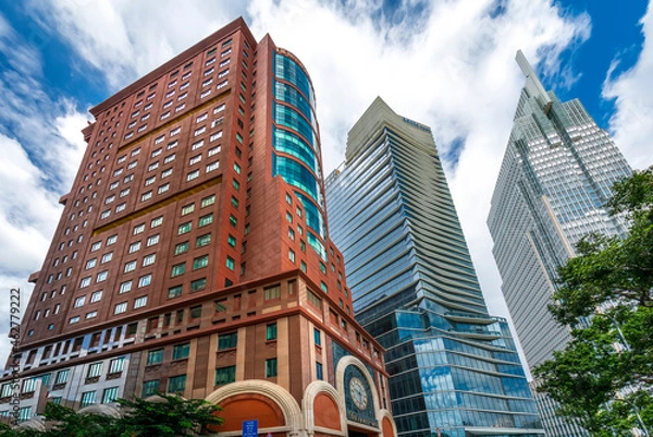 Fototapeta High-rise buildings rising in the morning sun show the strong economic development of Ho Chi Minh City, Vietnam