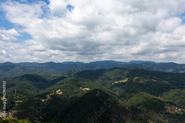 Obraz Mountain and forest with dramatic cloudy sky