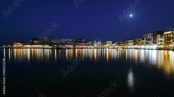 Fototapeta city skyline at night, Chania in Crete, Greece, starry sky