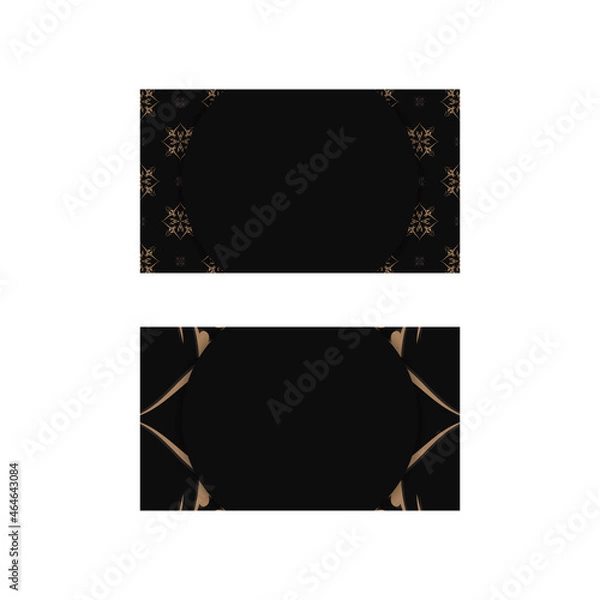 Fototapeta Business card template in black color with a luxurious brown ornament for your contacts.