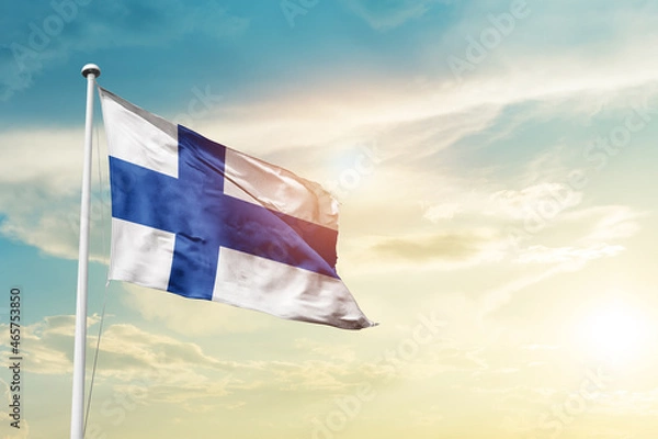 Fototapeta Finland national flag cloth fabric waving on the sky - Image